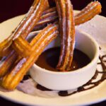 Indulge in Crispy Churros with Rich Chocolate Sauce Delight