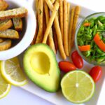 Wholesome Vegan Guacamole Paired with Crisp Veggie Sticks